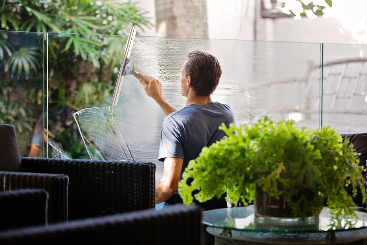 A local professional cleaning a bright home